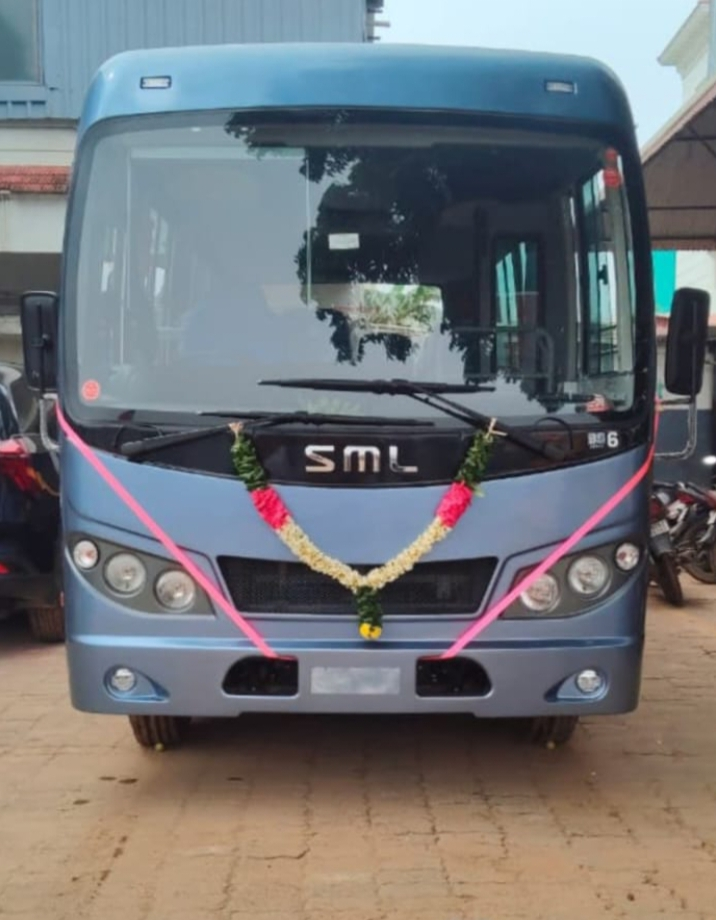 SML bus decorated with flower garland for group travel